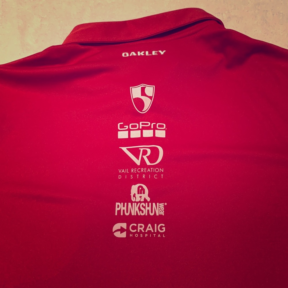 Oakley collared shirt w/ sponsors